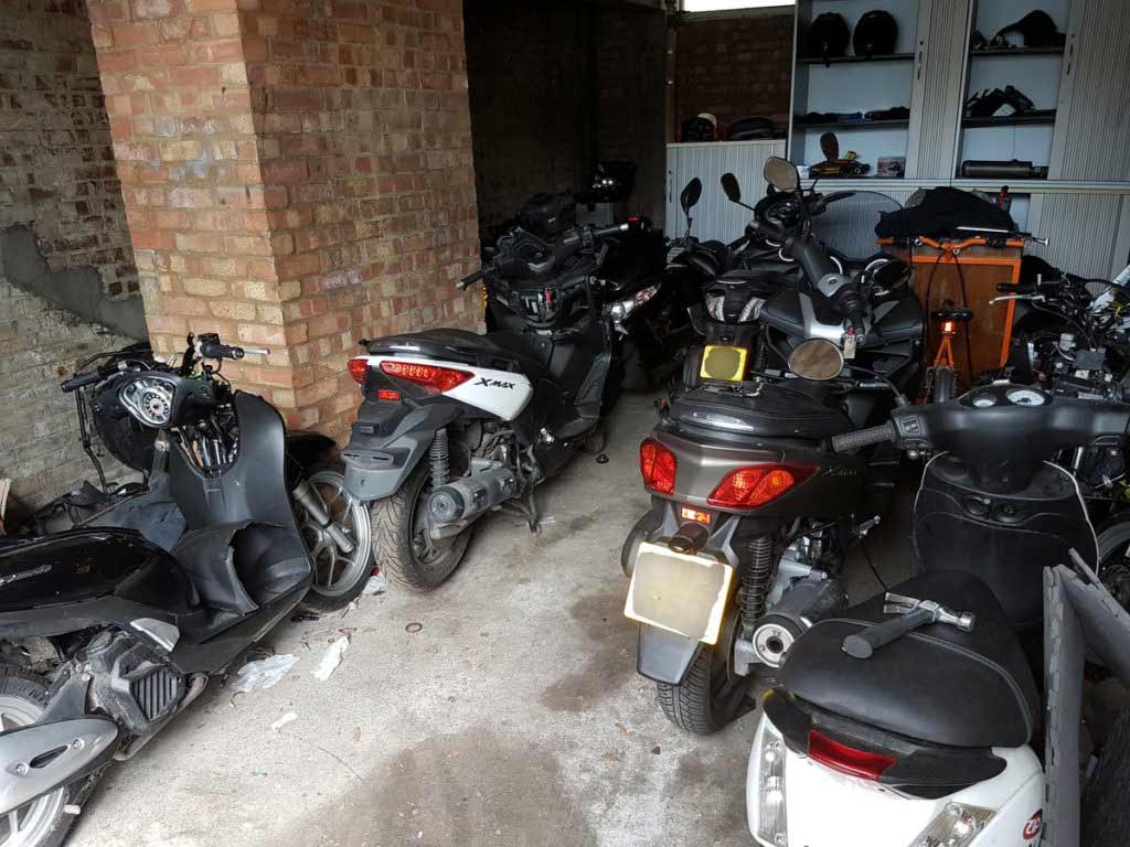 stolen mopeds gang garage 1024x768 - The Best Motorcycle Trackers